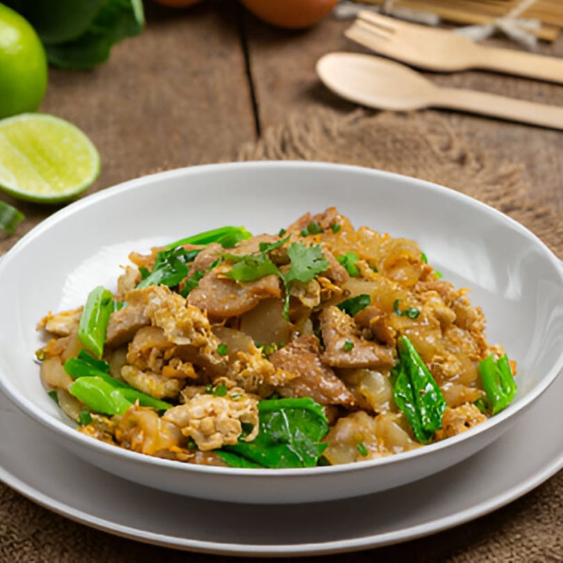 Grace ThaiNY's Pad See Ew with wide noodles, chicken, egg, and Chinese broccoli.