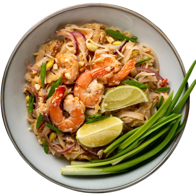 Grace ThaiNY's shrimp Pad Thai with noodles, red onions, bean sprouts, lime, and scallions.