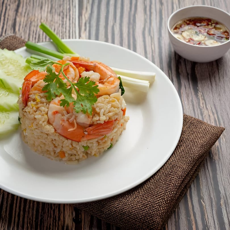 Grace ThaiNY's shrimp fried rice with cucumbers, green onions, and dipping sauce.